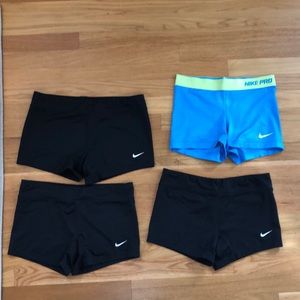 One Medium & 3 Small Nike spandex